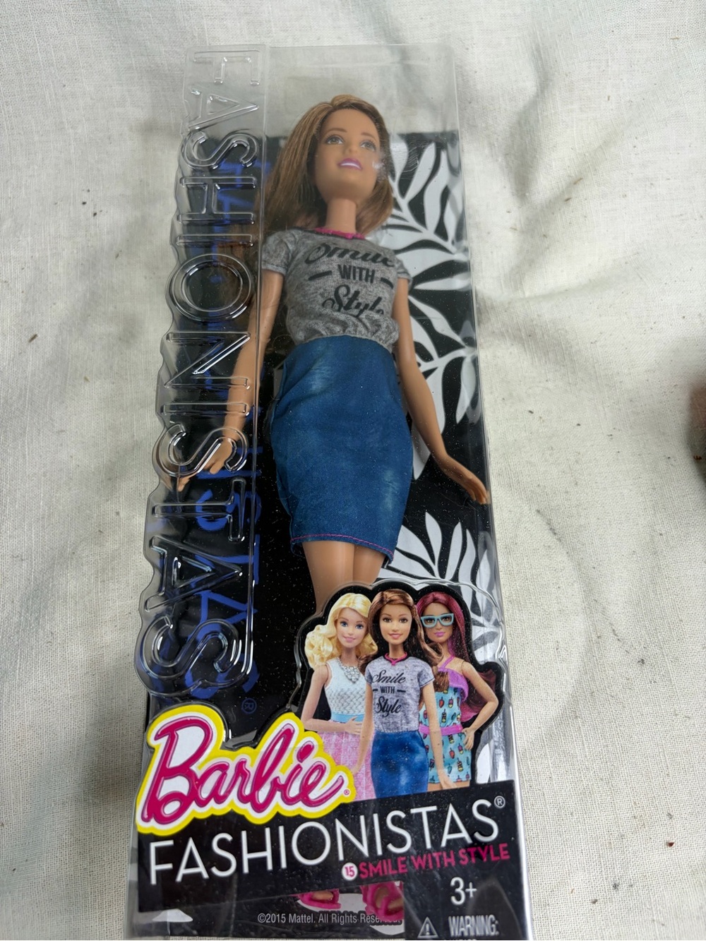 Barbie Doll Packaging with Pink and Black Accents